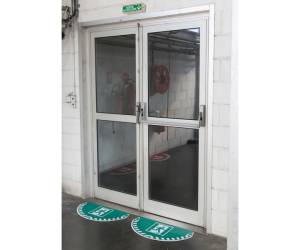 Adesivo segnalatore Take Care da terra uscita di emergenza 70 x 35 cm - 16832 - 1